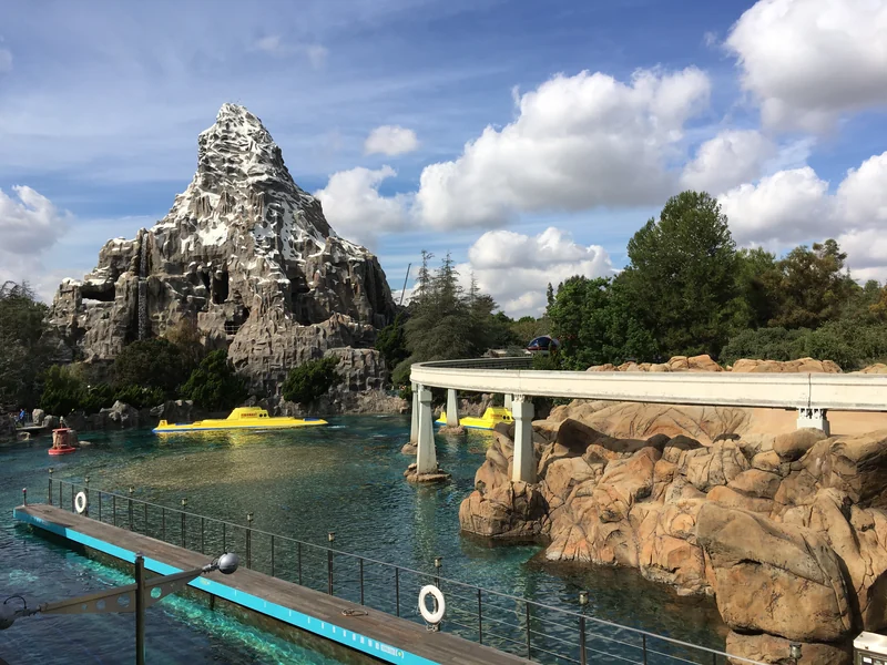 Yellow submarines in the Tomorrowland lagoon beneath the Matterhorn and Monorail track