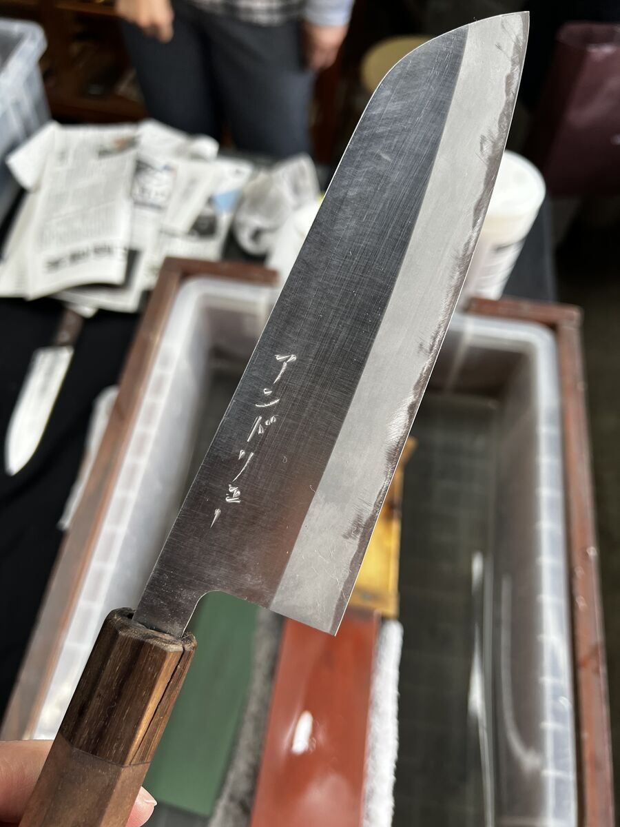 Hand-forged Japanese knife blade with kanji engraving