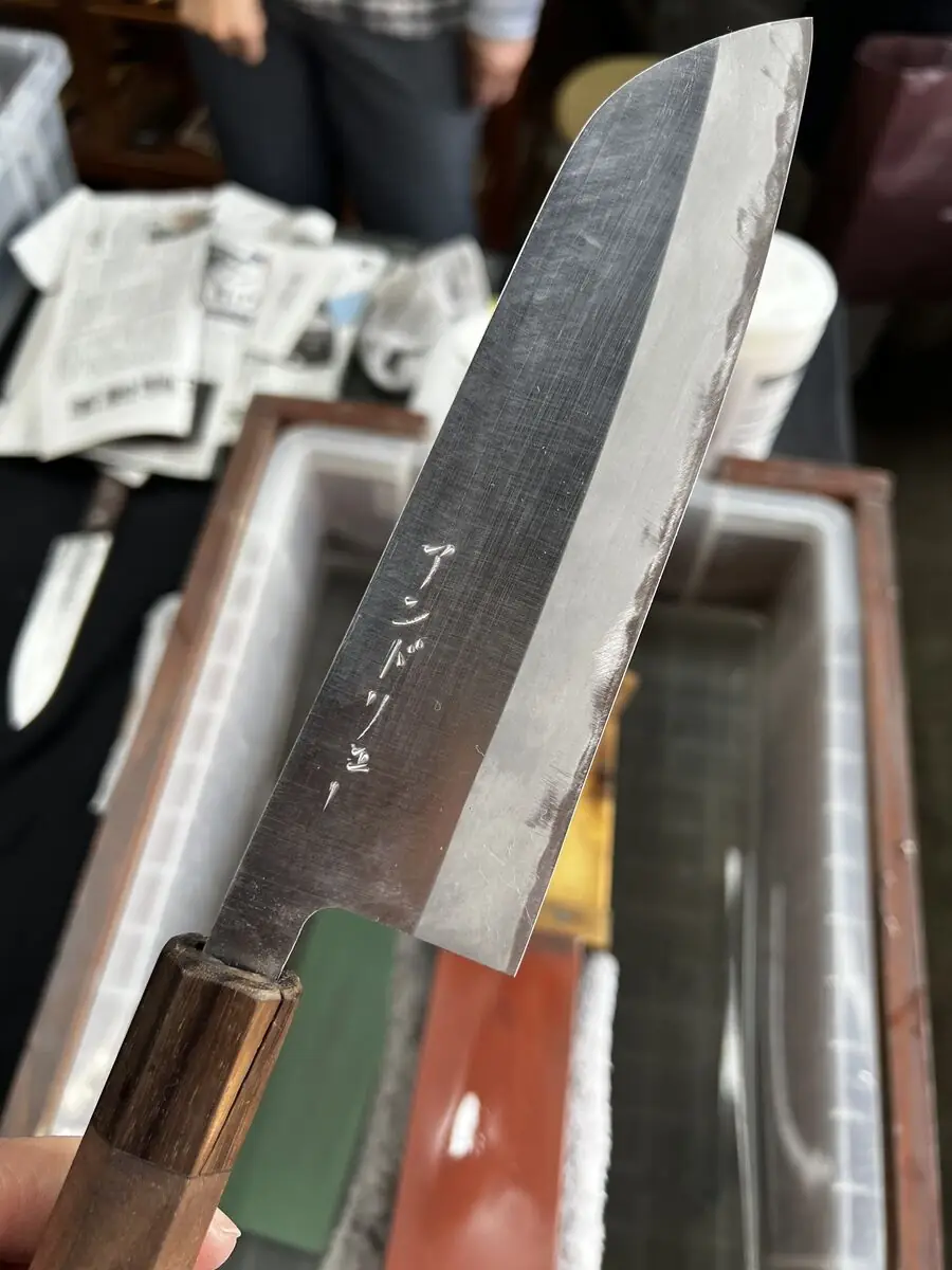 Hand-forged Japanese knife blade with kanji engraving