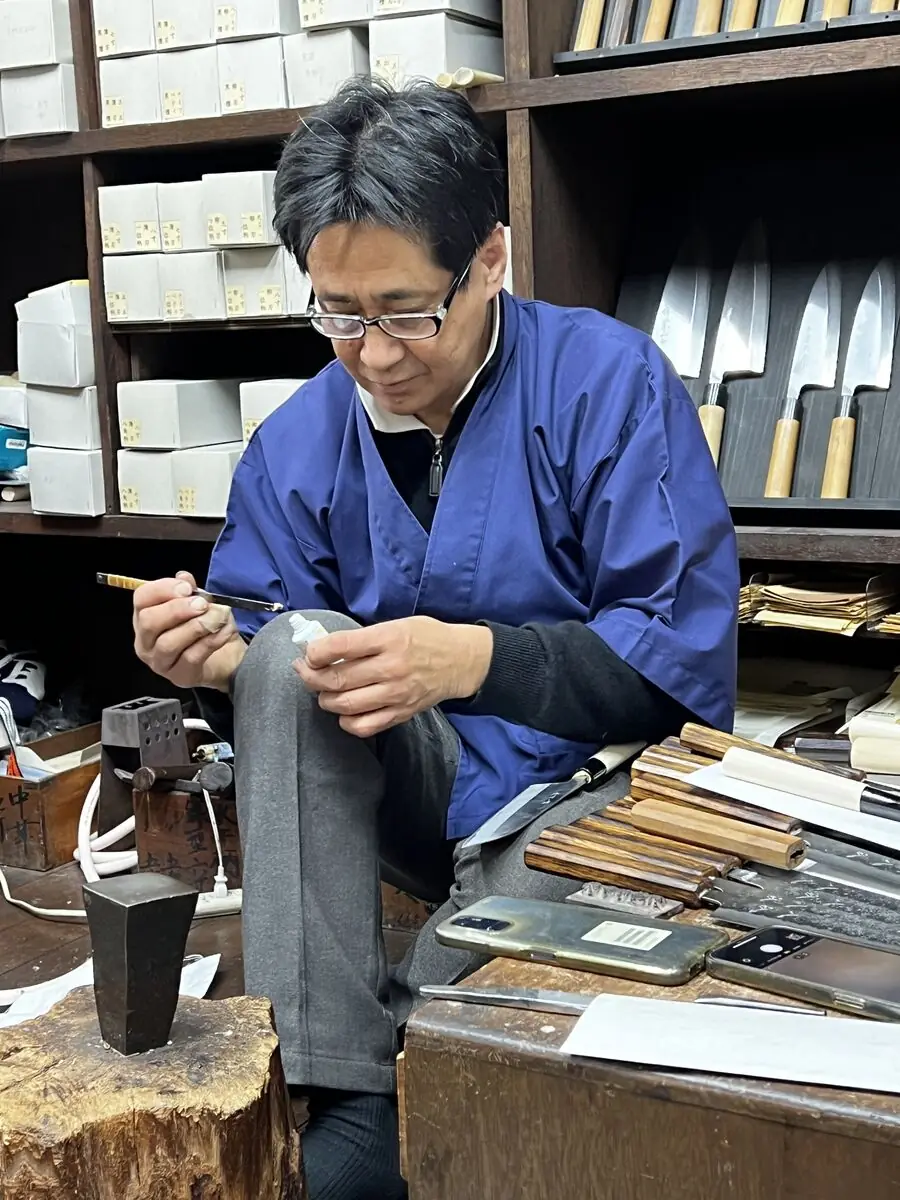 Japanese knives displayed in an artisan shop
