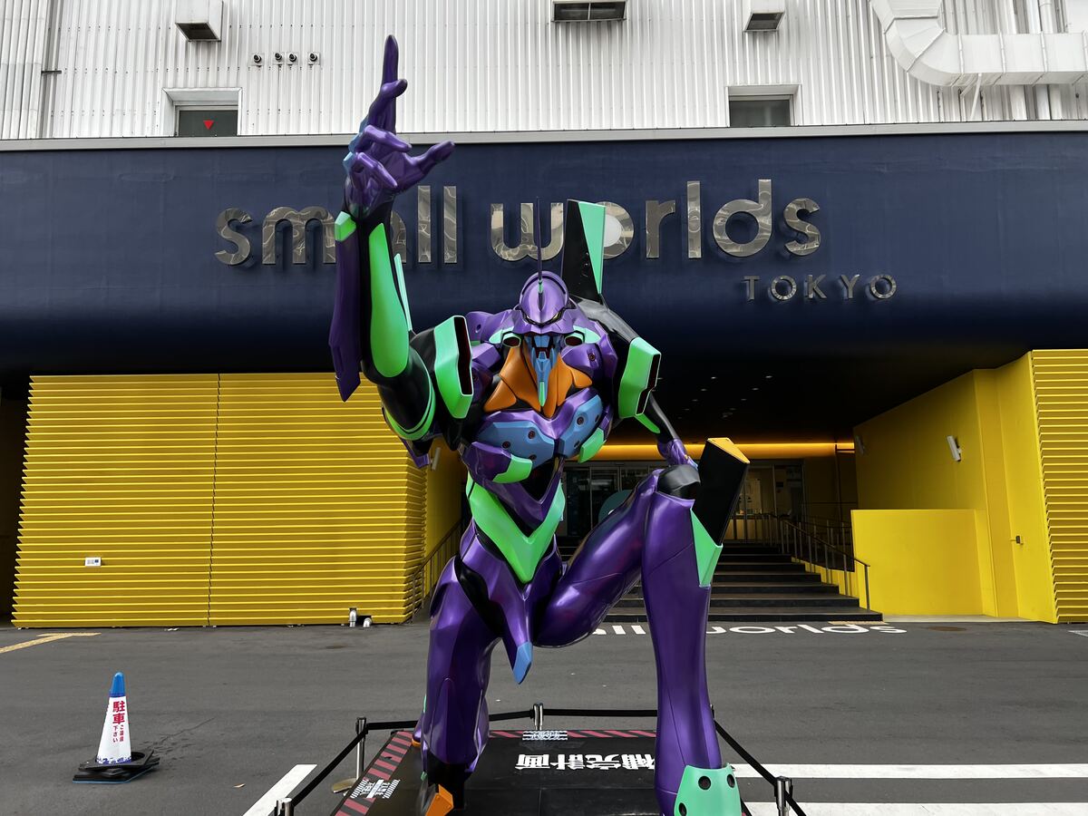 Evangelion statue outside Small Worlds Tokyo entrance